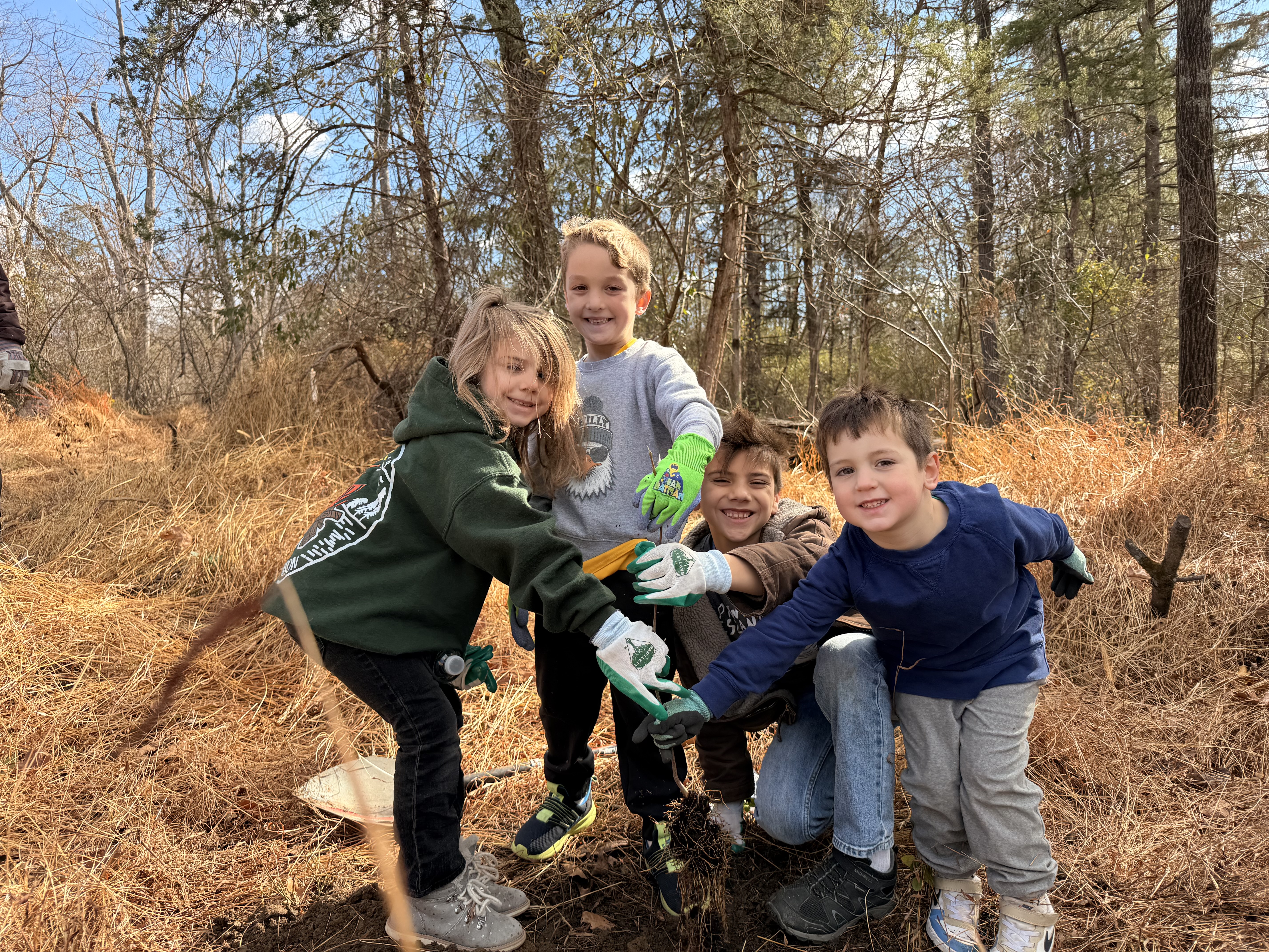 Firebirds volunteers planting trees at Deer Wood Campground